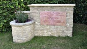 Memorial to Maj Charles Strafford MBE at Ranville.
