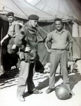 L/Cpl Terry Miller checking a civilian worker entering Whittington camp, Cyprus 1958.