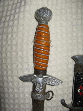 Hilt of Nazi ceremonial dagger captured in NW Europe by Sgmn Tom Stevens in 1944-45, undated.