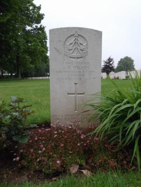 Headstone of Tpr AH Wilson, Ranville War Cemetery, May 2013.
