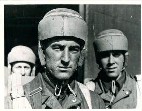 Early paratroopers wearing the locally manufactured rubber "Flash Gordon" helmet, c1940.