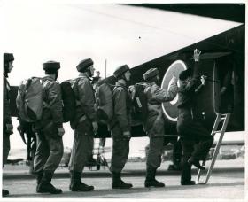 Paratroops recruits emplane for the first time.