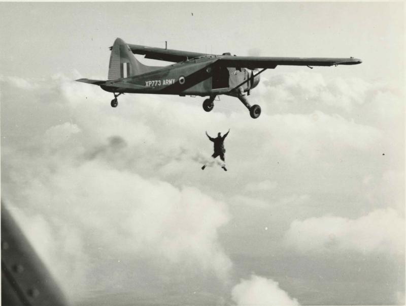 An Army free fall parachutist dropping from a BEAVER light liaison aircraft. Date unknown.
