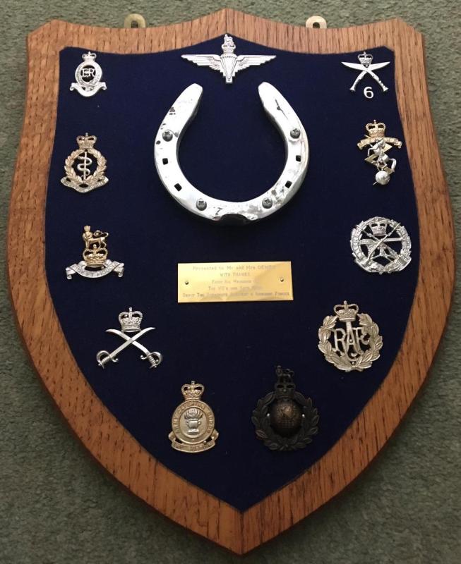 Shield presented to Mr & Mrs Dewey, containing shoe from Pegasus III