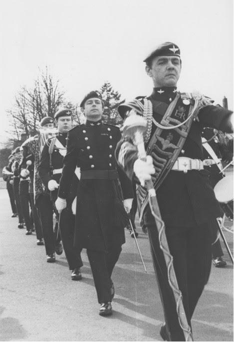 Black and white image of 1 PARA Band marching