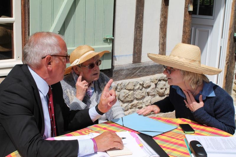 Colour photo of Gil Boyd Interviewing Therese Anne MALLET with French interpreter Marie-Louise BESSON