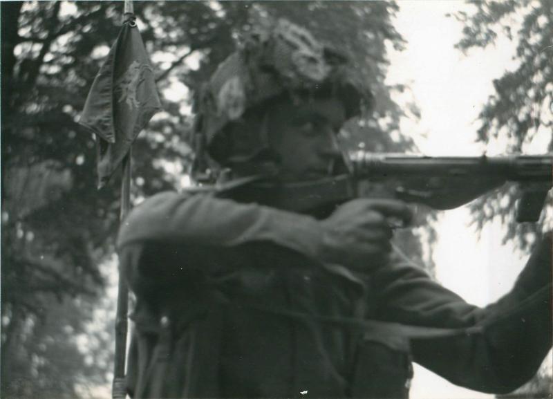 Private Morris on guard with a Sten gun at Divisional HQ, Oosterbeek.