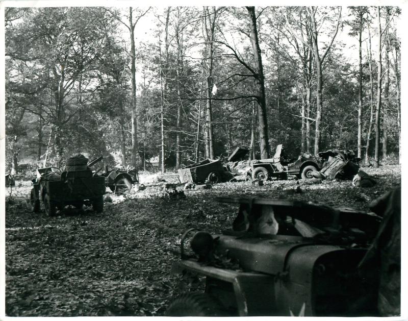 Wrecked jeeps and trailers in the Hartenstein Hotel grounds (Divisional HQ).