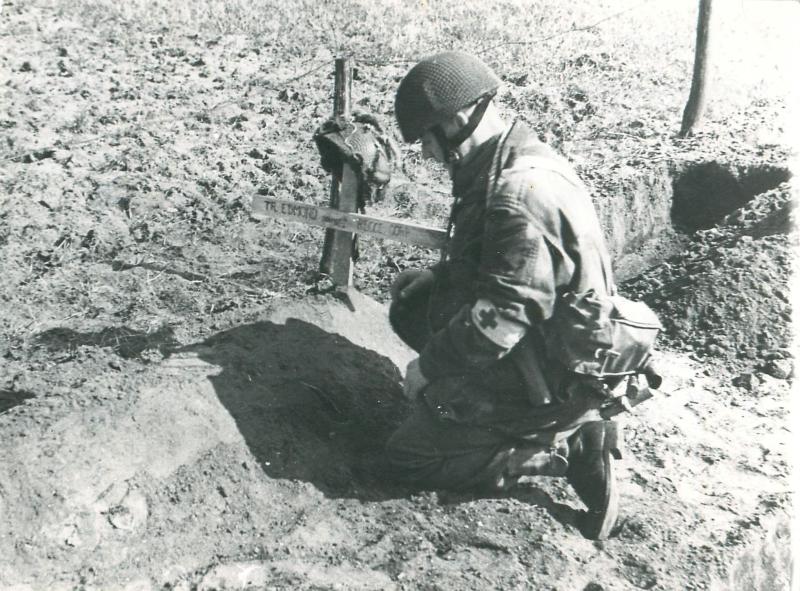 Corporal Mills pays his repect to the grave of Trooper Edmond.