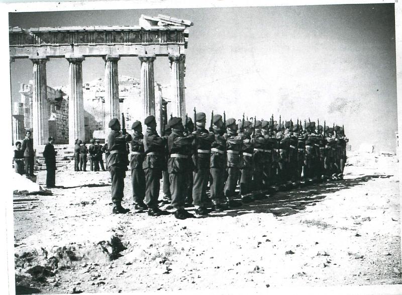 A Company 6th Parachute Battalion raise the Greek flag at the Acropolis.