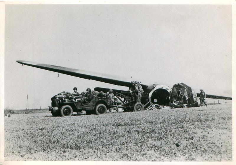 A Horsa glider is unloaded on the landing zone of the Rhine Crossing operation.
