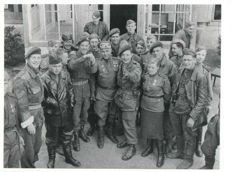 Canadian paras meeting Russian troops on the east side of Wismar. May 2nd 1945.