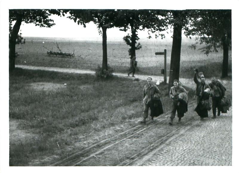 Allied POWs making their way home. Wismar 1945.