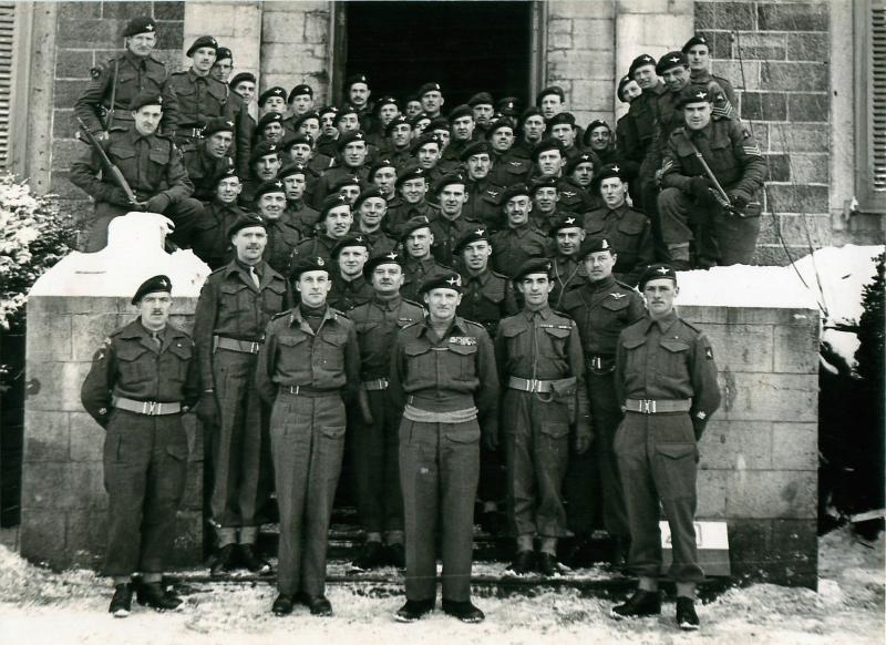 Group photo of Montgomery, Maj-Gen Bols and members of the division. January1945.