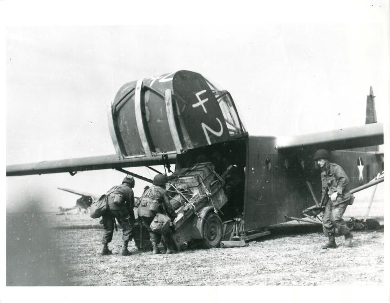 US soldiers unload a glider plane after landing near Wesel.