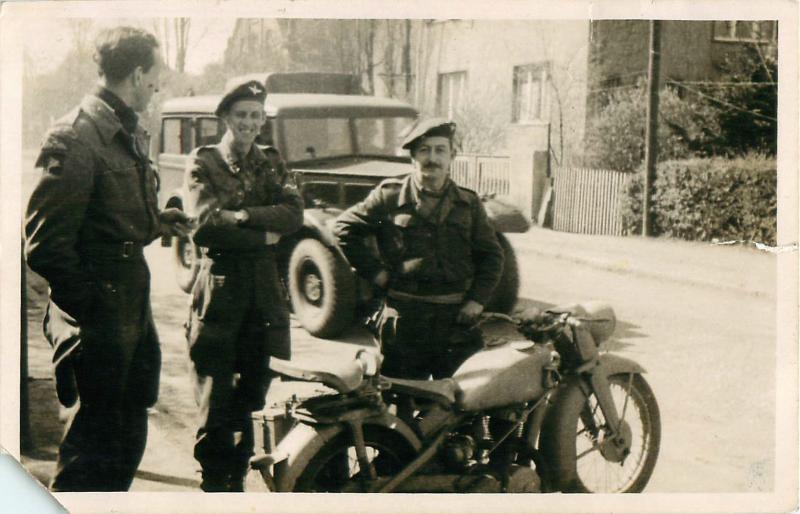 Three paratroopers including Col Pine Coffin stand outside battalion HQ at Calle.