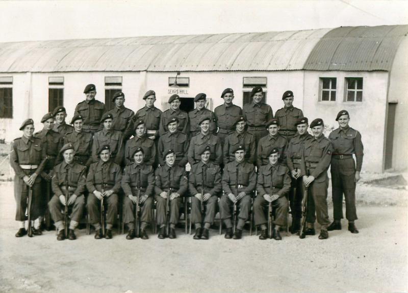 Group photo of 3 PARA outside billets in Palestine.