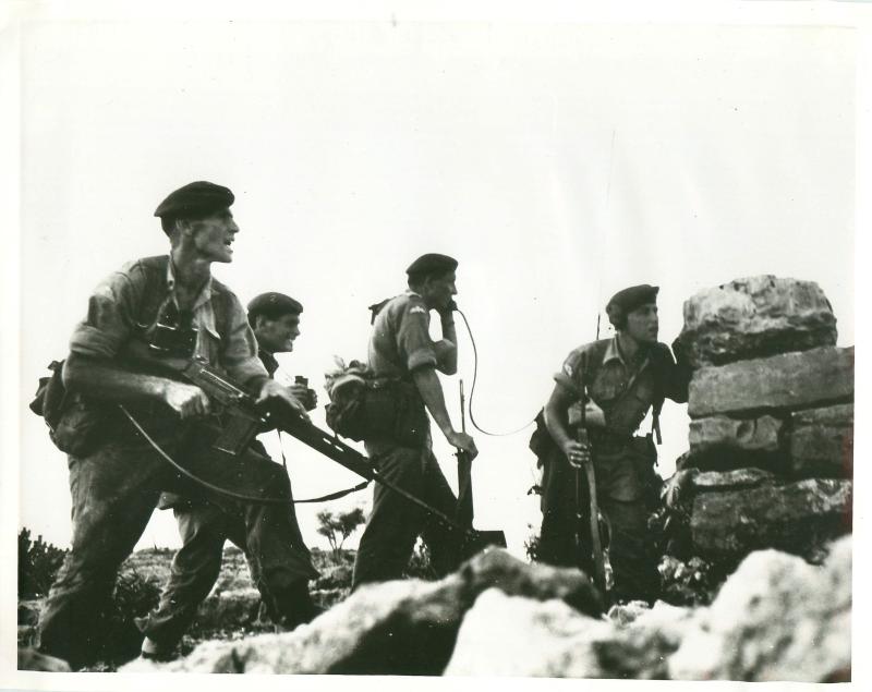 Company commander caling for fire support while under fire, Radfan 1964.