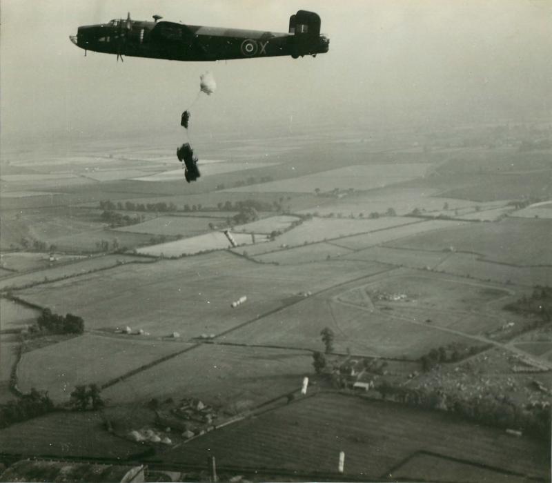 Halifax bomber dropping Jeep and containers during a practice run Netheravon, 1946-47.