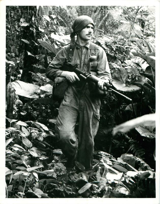 Paratrooper on jungle patrol, Borneo.