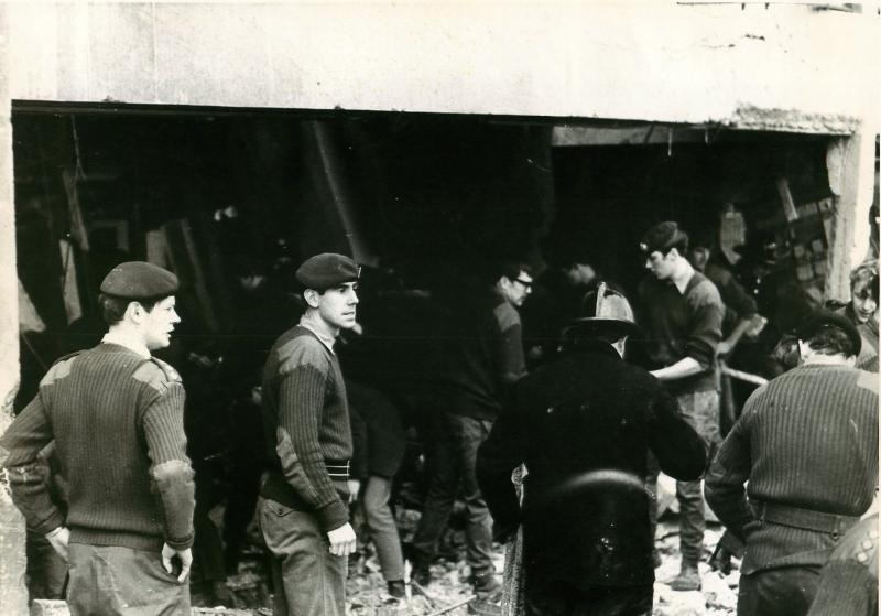 Paratroopers including Captain Graham Gilbert, adjutant fo 3 PARA clean up IRA bomb damage at Aldershot.