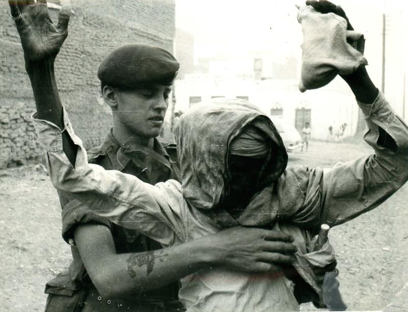 A Paratrooper conducting a stop and search, Aden, 1967