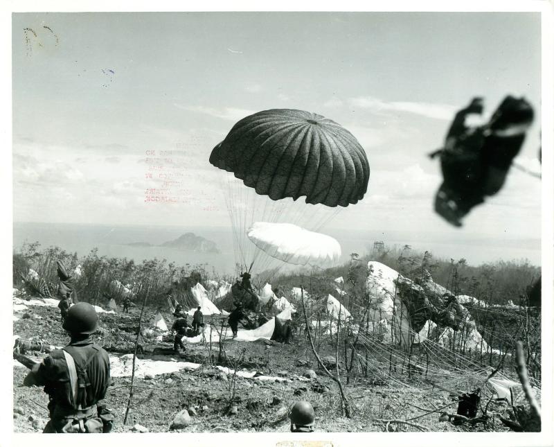 Parachutists of the 503rd Parachute Regiment landing on B field, February 1945.