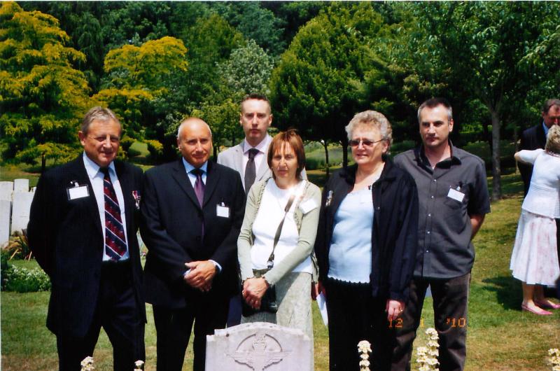 Members of Corporal Stephen Prior's family at his gravestone.