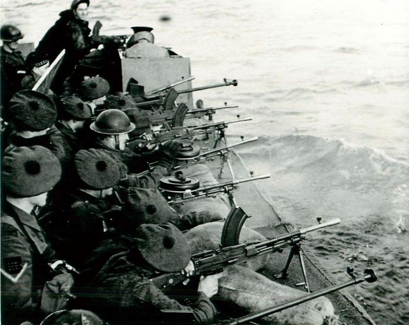 Troops train for the Bruneval raid by firing Bren guns from a landing craft.