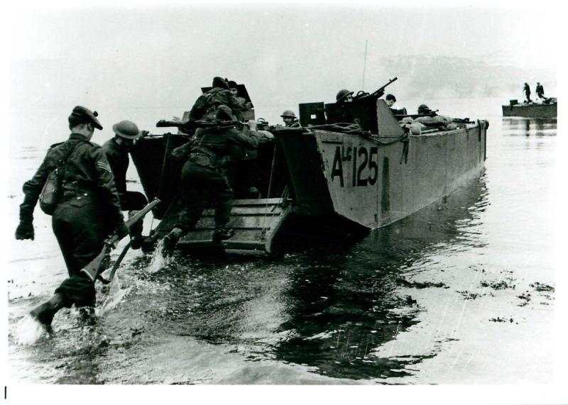 Troops leave Bruneval by landing craft.