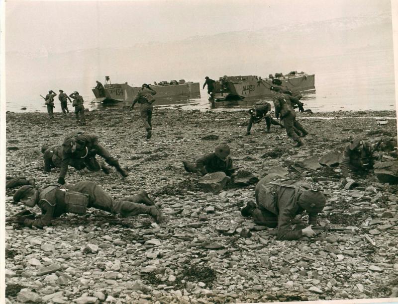 Troops securing the beach after landing.