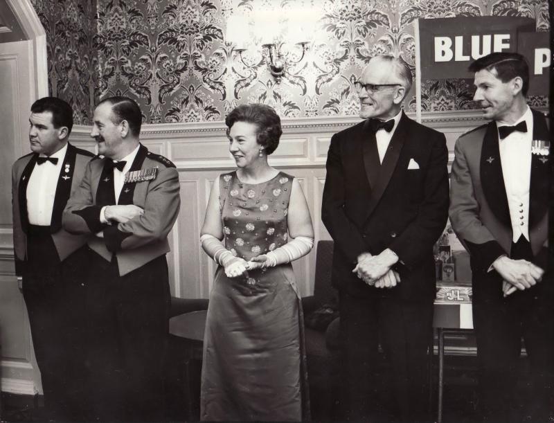 Brigadier Hill receiving guests at a ball, c.1970