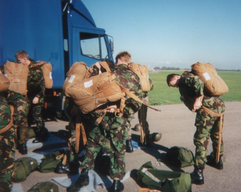 4 Para parachute course recruits gearing up for their Skyvan descent.