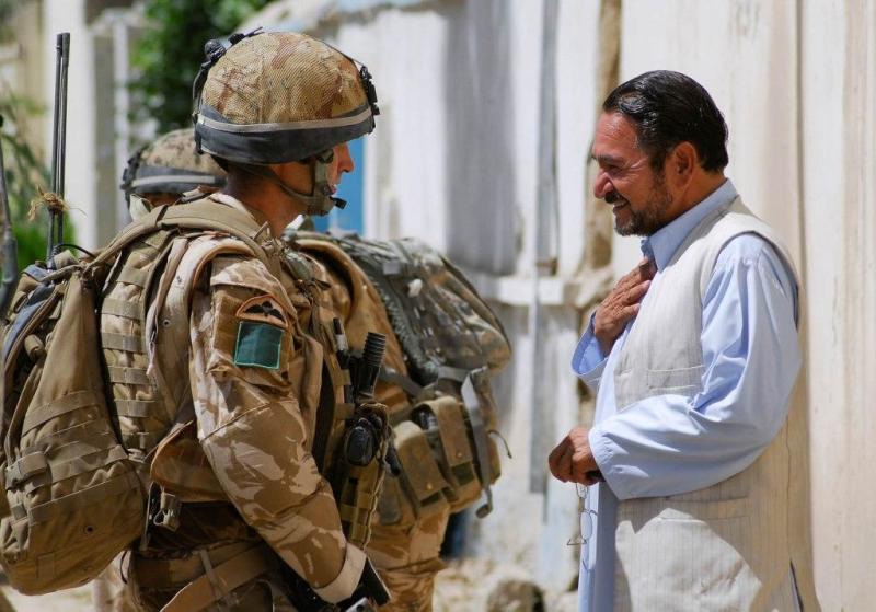 Local man greets soldiers of 3 PARA in Kandahar City, June 2008