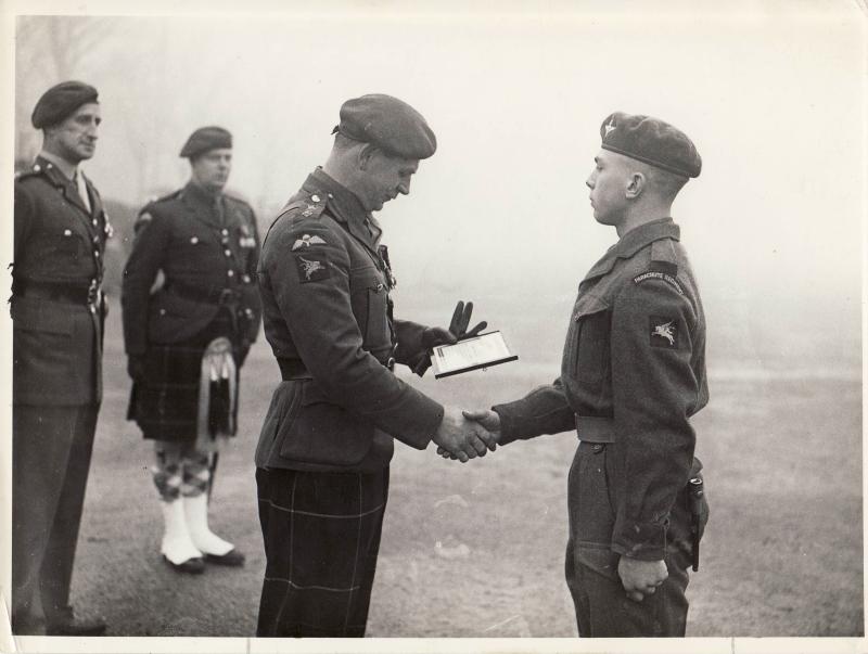 Lt Col Alistair Pearson presenting an award