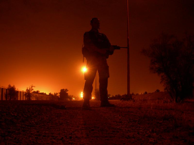 Para silhouette on a night patrol, Iraq, Op Telic 7, 2006