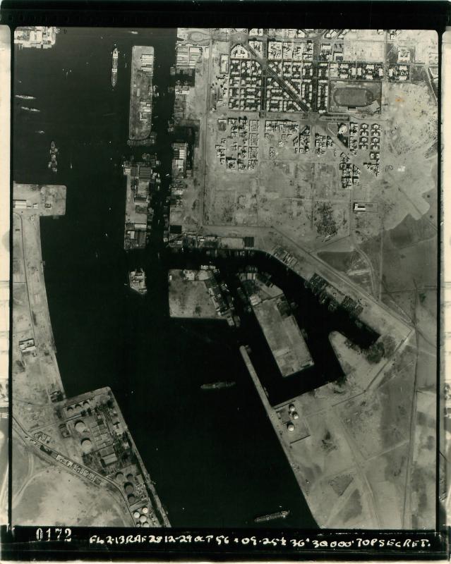 Aerial shot of Port Said showing part of the Suez Canal and surrounding buildings and land.