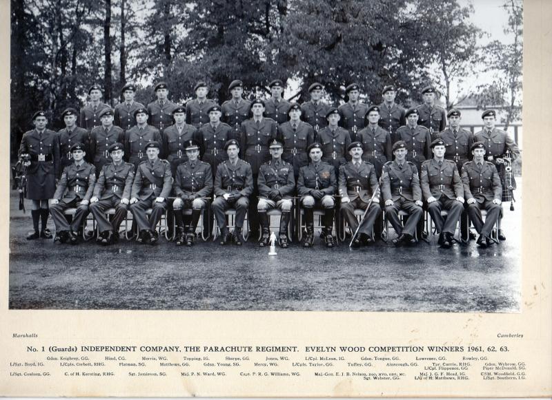 Group photograph of Guards Parachute Company, Evelyn Wood Competition Winners 1961, 1962 and 1963 -  "Catch us if you can!"