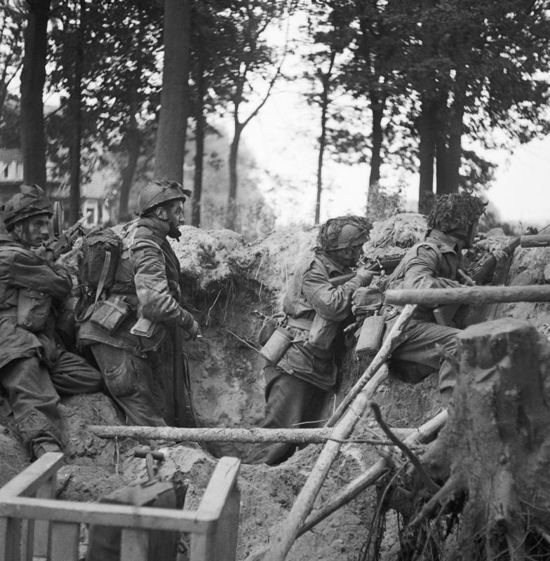 AA Men of No 3 Platoon, R Company, 1st Parachute Battalion armed with Bren gun and No. 4 rifles defend a large shell hole.