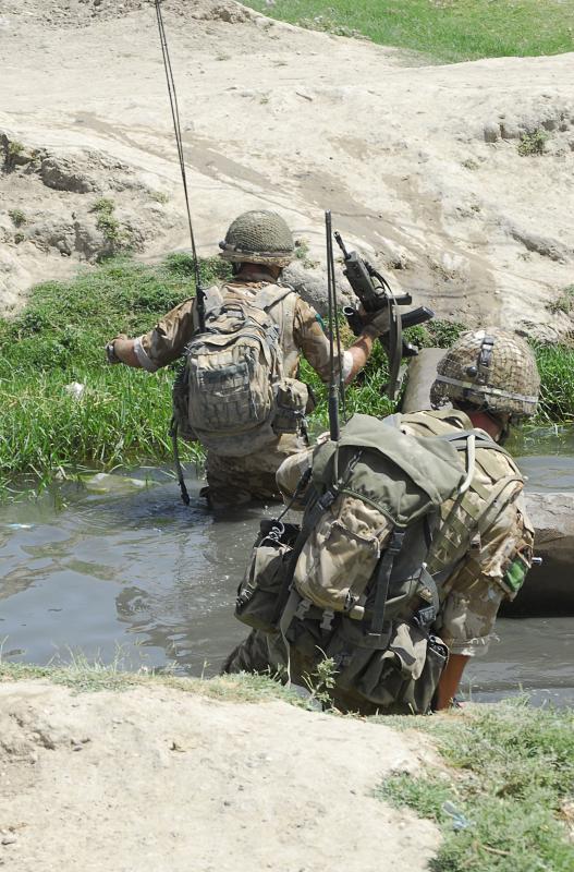 Soldiers of 3 PARA crossing a ditch, Kandahar, Afghanistan, 2008