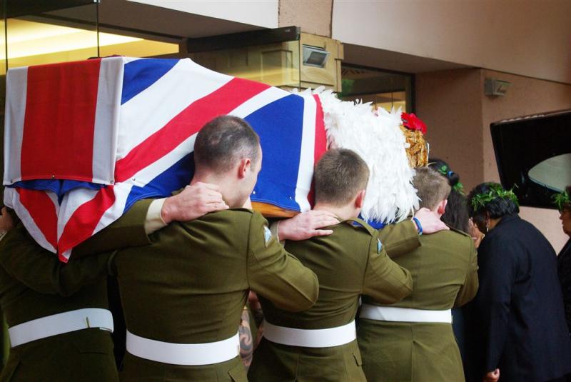 Pallbearers from 3 PARA enter the church for the funeral of Pte John Howard, 21 December 2010