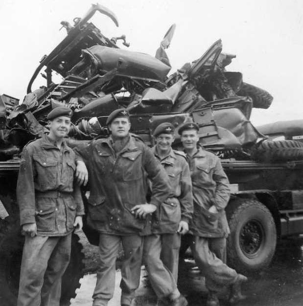 Men of 2 PARA stand in front of the remains a 1 Tonner after a Heavy Drop failure at Swindon, late 1950s