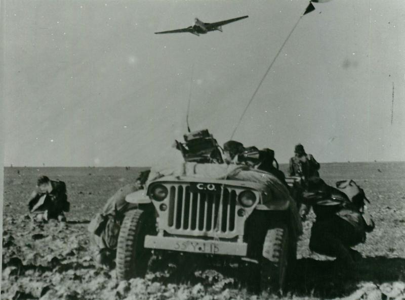 Men of 16 Para Brigade take cover from "enemy" aircraft during training exercise, Jordan 1953