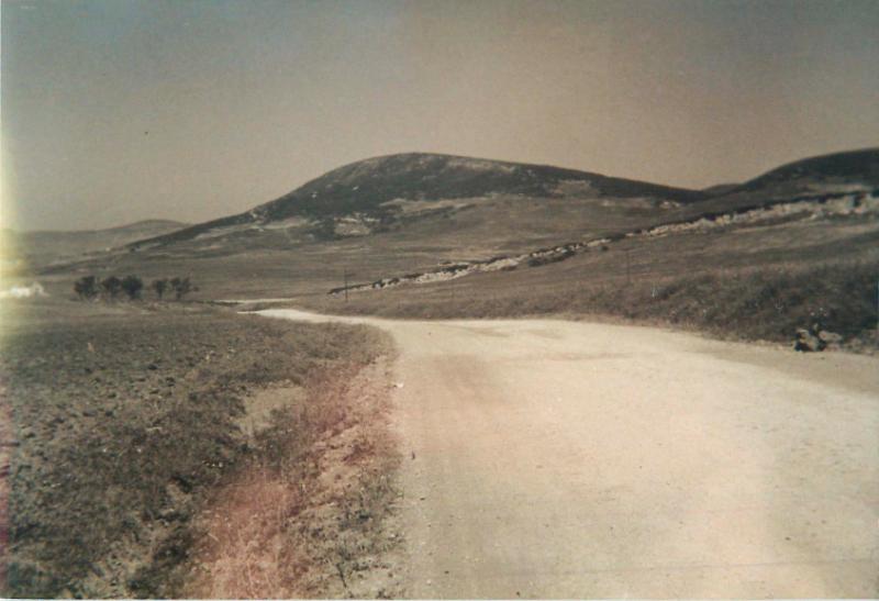 A dusty road leads to Green Hill, attacked by 3rd Parachute Battalion in March 1943.