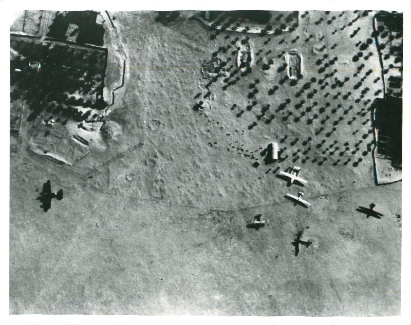Aerial photo of Bone airfield shows German DF230 gliders and and Italian bomber on the ground.
