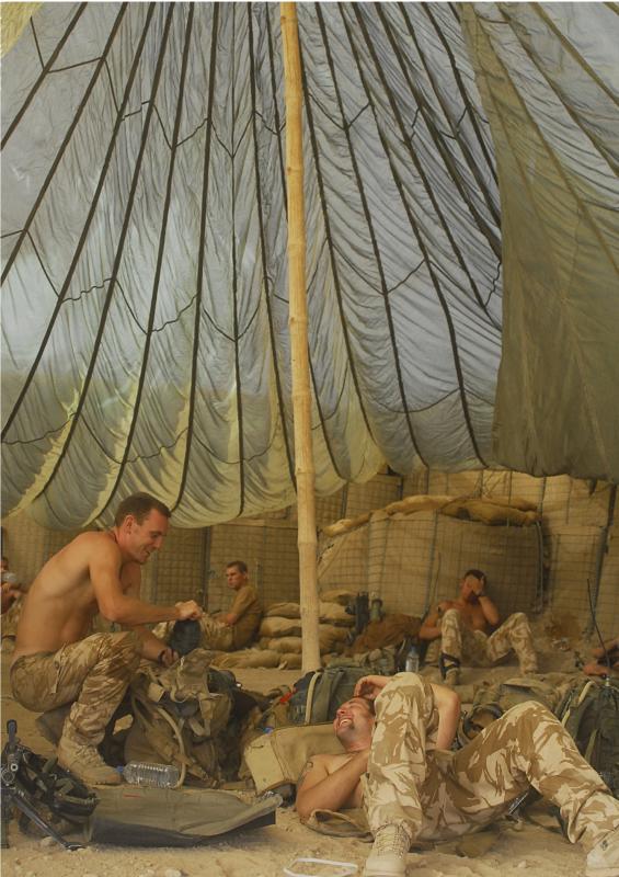 Paras display their Airborne initiative as a parachute is used as a roof, FOB Robinson, Afghanistan, July 2008
