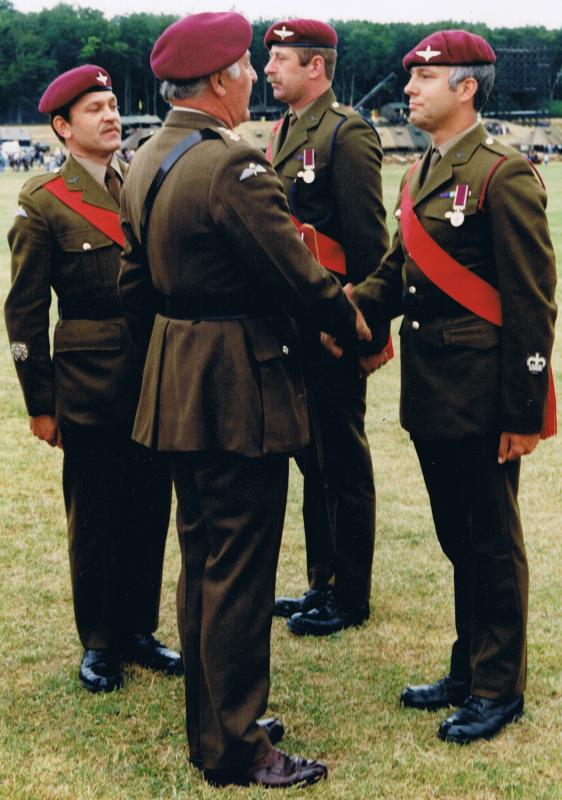 'Paddy' Rehill receives his Long Service and Good Conduct Award from Gen Howlett, Rushmoor Arena, 1990