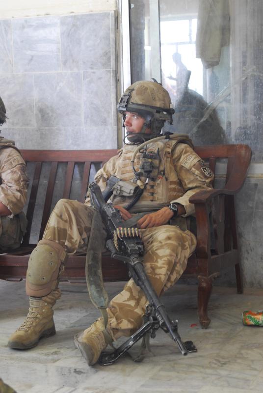 Soldier from A Coy, 3 PARA rests with a GPMG, Kandahar, Afghanistan, 2008