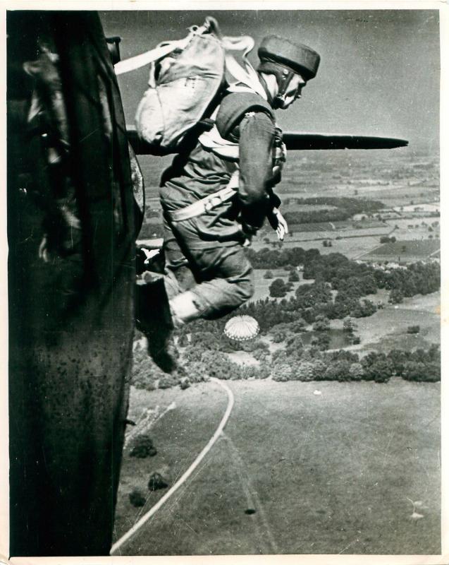 Early paratrooper adopts correct jumping position on exiting the aircraft over Tatton Park.