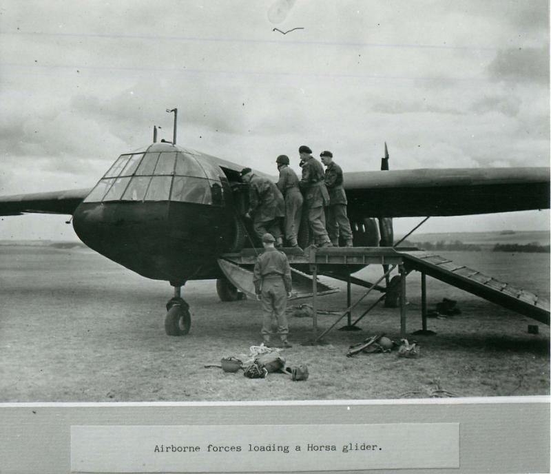 Airborne soldiers load a Horsa glider.